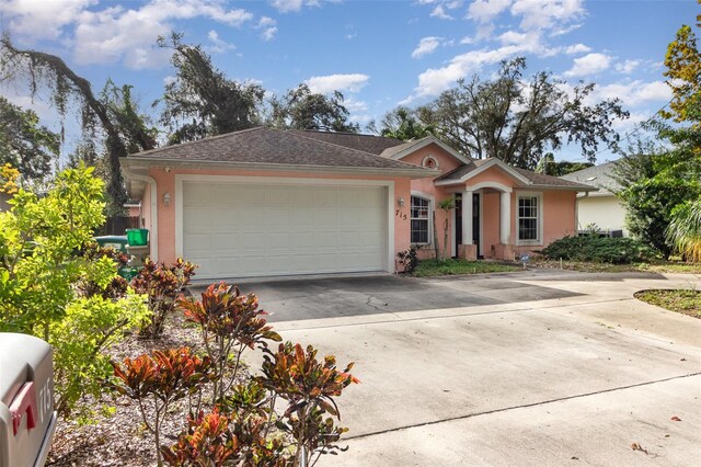 715 Unabelle Ave, Daytona Beach, FL 32117 - ranch-style home featuring a garage