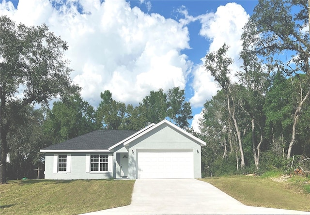 ranch-style house featuring a front yard and a garage