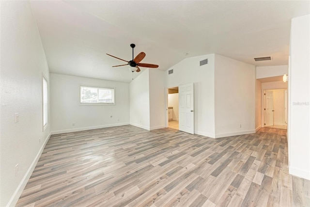 unfurnished room featuring ceiling fan, lofted ceiling, and light hardwood / wood-style floors