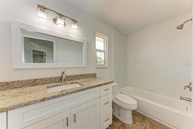 full bathroom featuring vanity, a textured ceiling, toilet, and shower / bathtub combination