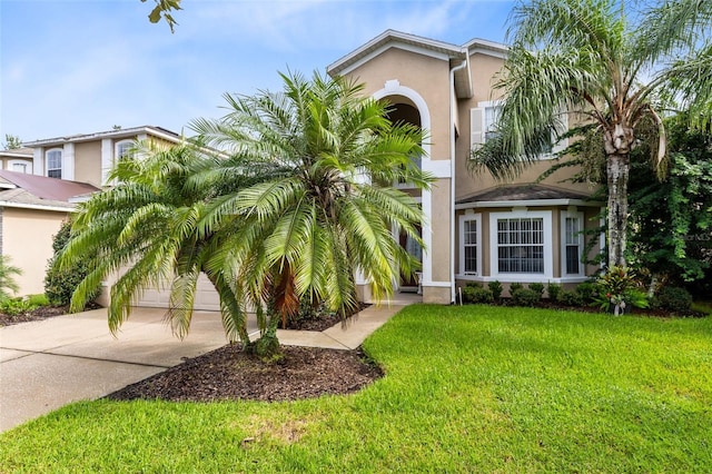 view of front facade featuring a front yard