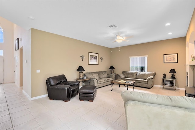 living room with light tile patterned flooring and ceiling fan