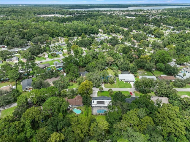 bird's eye view with a residential view and a view of trees