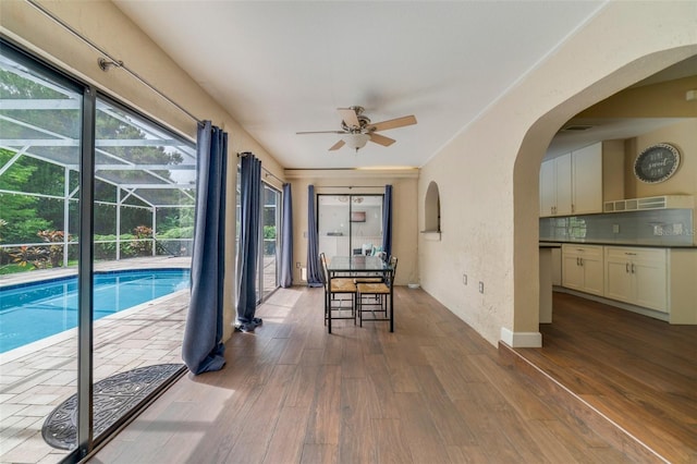 668 Coral Way, Winter Springs, FL 32708 - view of swimming pool featuring ceiling fan and arched walkways
