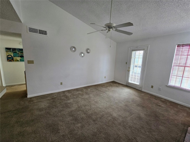 4401 Thornbriar Ln Unit 202, Orlando, FL 32822 - carpeted spare room with a ceiling fan, a textured ceiling, lofted ceiling, and baseboards