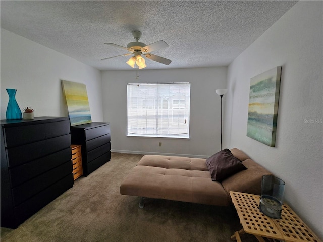 4401 Thornbriar Ln Unit 202, Orlando, FL 32822 - sitting room featuring carpet, a textured ceiling, and a ceiling fan