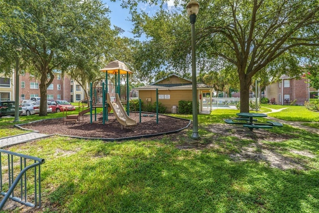 4401 Thornbriar Ln Unit 202, Orlando, FL 32822 - community playground featuring a lawn