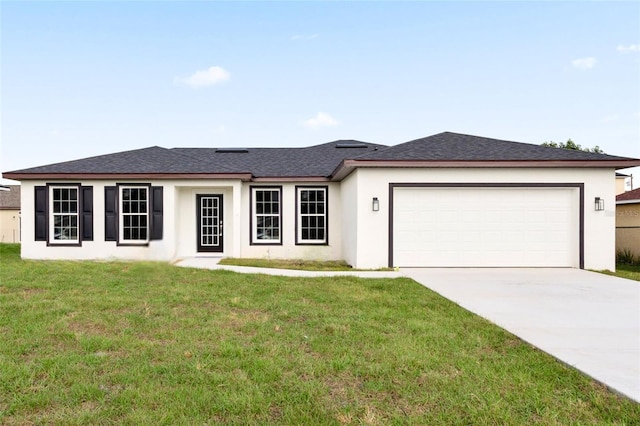 ranch-style home with a garage and a front lawn