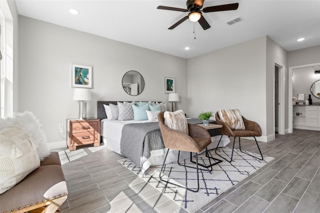 bedroom featuring ceiling fan and hardwood / wood-style flooring