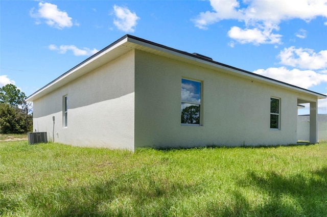 view of property exterior with a lawn