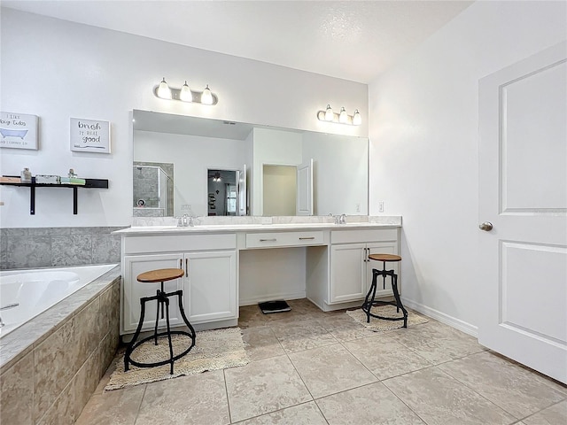 bathroom featuring vanity, tile patterned floors, and plus walk in shower