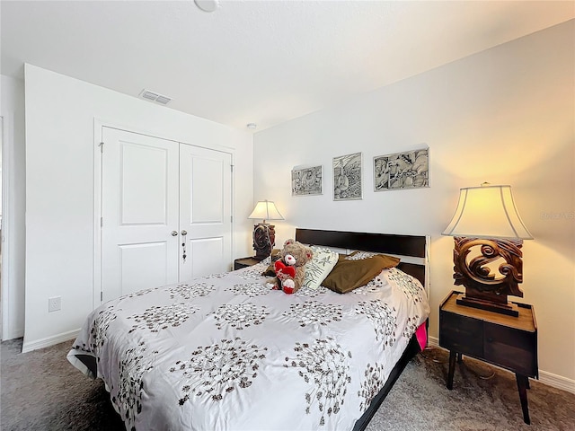 carpeted bedroom with a closet