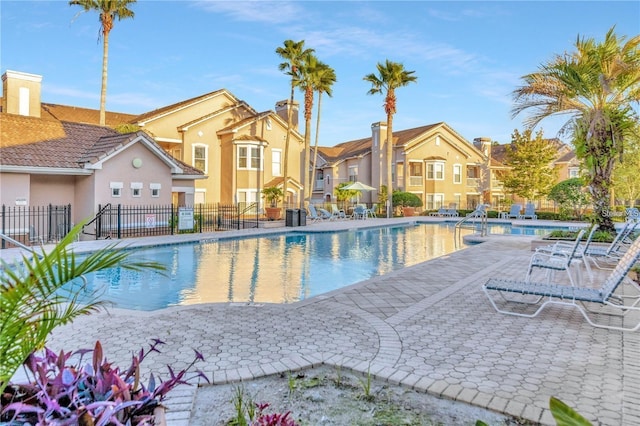 view of swimming pool featuring a patio