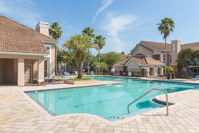 view of pool featuring a patio