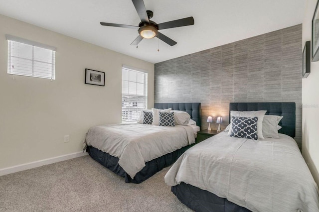 bedroom featuring carpet flooring and ceiling fan