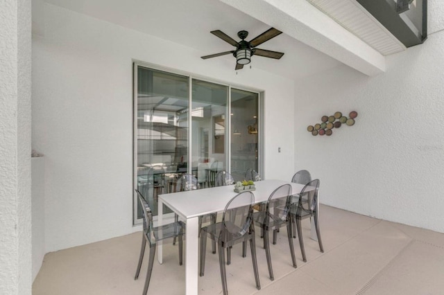 dining space with ceiling fan