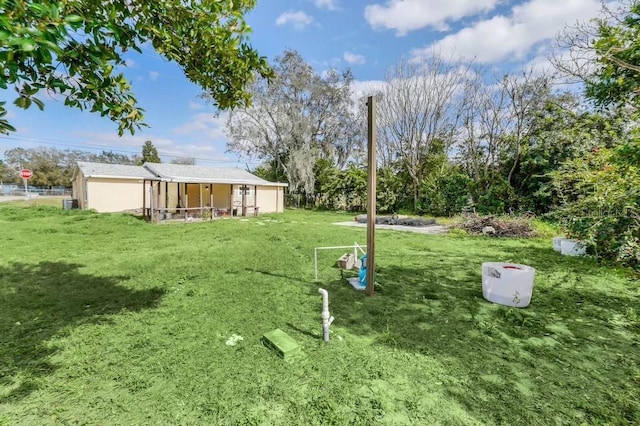 5351 E Johnson Ave, Haines City, FL 33844 - view of yard with a sunroom