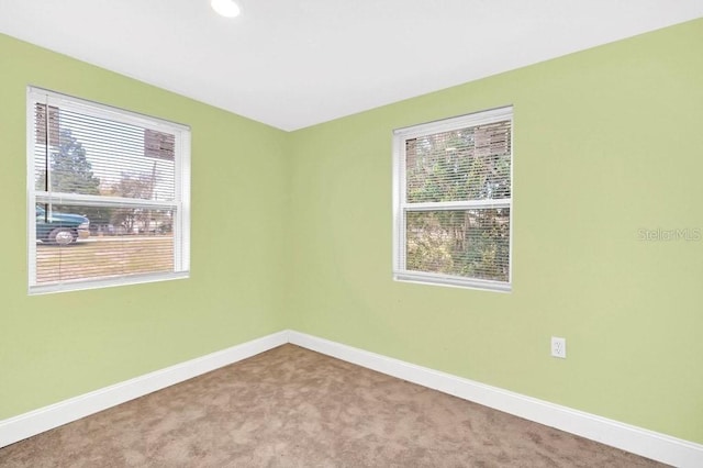 5351 E Johnson Ave, Haines City, FL 33844 - empty room with carpet, recessed lighting, and baseboards