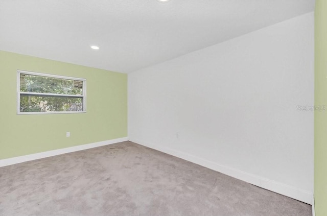 empty room with carpet flooring