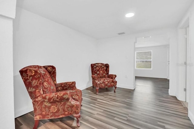 living area featuring hardwood / wood-style flooring