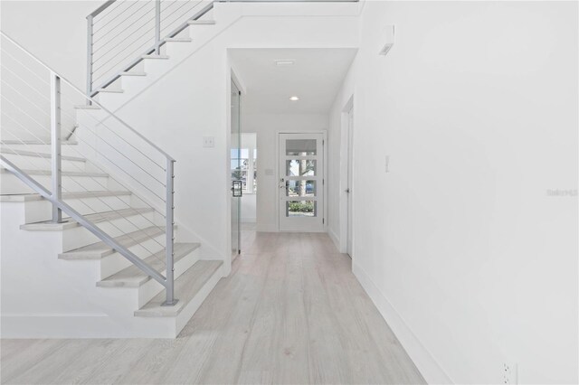 entryway with light wood-type flooring