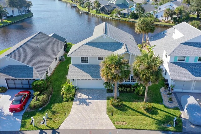 bird's eye view with a water view