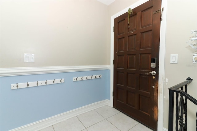 entryway featuring light tile patterned floors