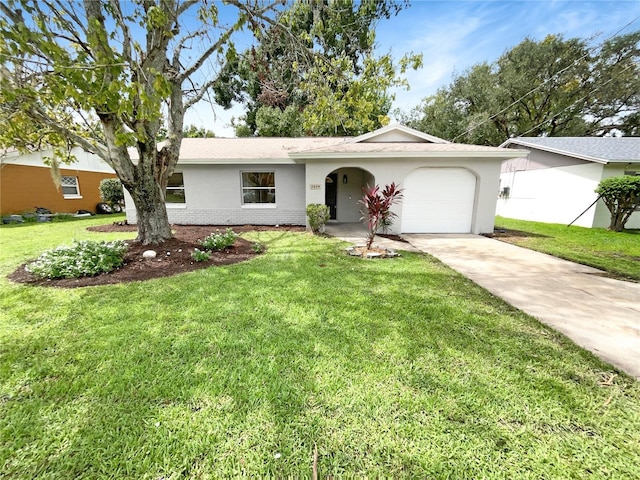 ranch-style house with a garage and a front lawn