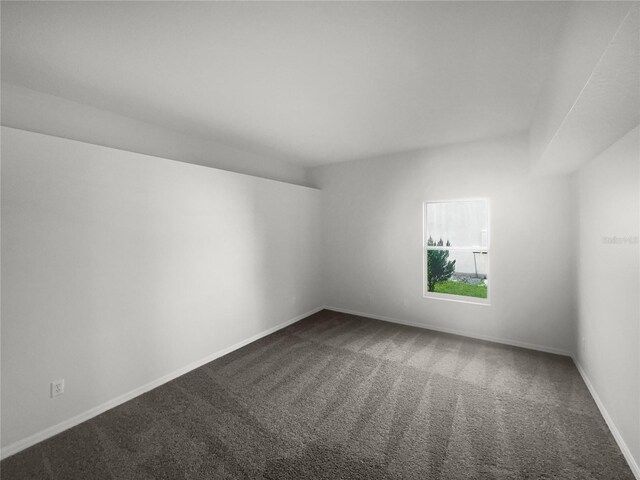 unfurnished room with carpet floors