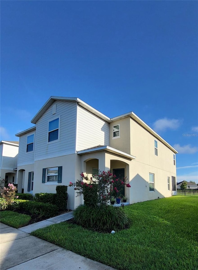 exterior space with a front lawn