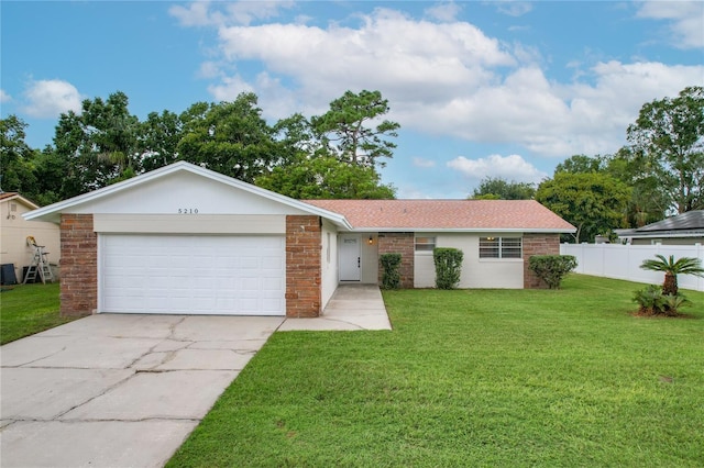 ranch-style house featuring an attached garage, driveway, a front lawn, and fence