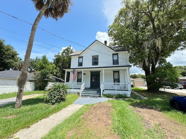 view of front of property featuring covered porch