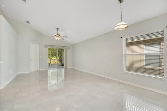 unfurnished room with light tile patterned floors, lofted ceiling, and ceiling fan