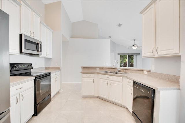 kitchen featuring white cabinets, lofted ceiling, sink, and black appliances