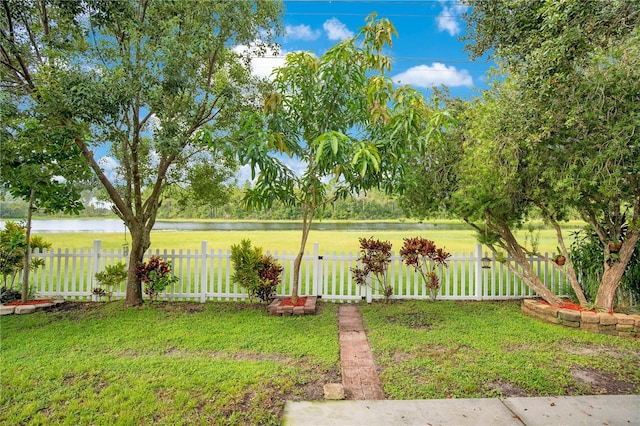 view of yard with a water view