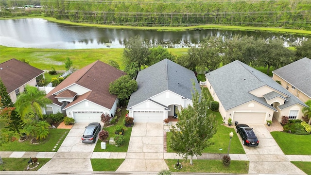 drone / aerial view with a water view