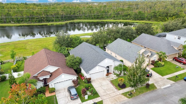 birds eye view of property featuring a water view