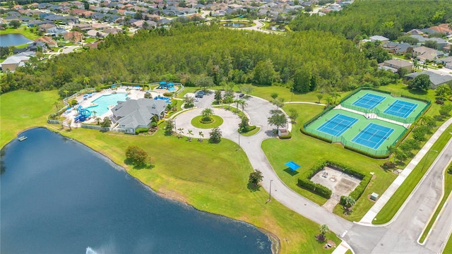 drone / aerial view with a water view