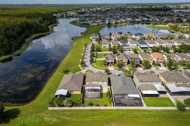 aerial view featuring a residential view and a water view