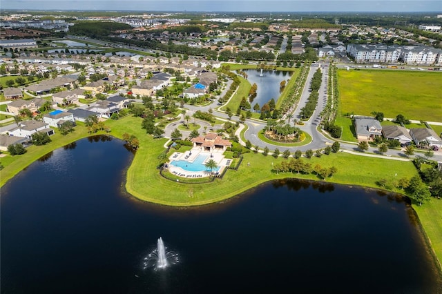 aerial view featuring a residential view and a water view