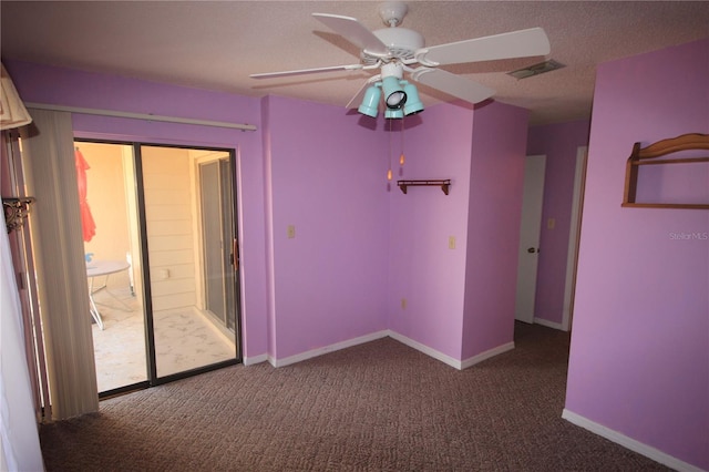 unfurnished bedroom featuring a closet, carpet, ceiling fan, and a textured ceiling