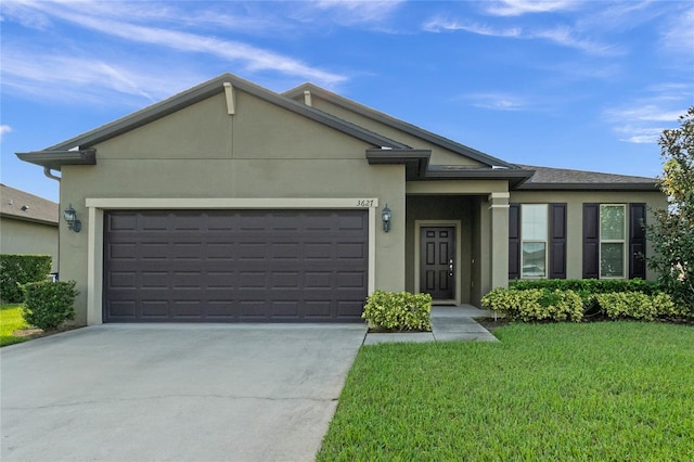 ranch-style house with a garage and a front yard