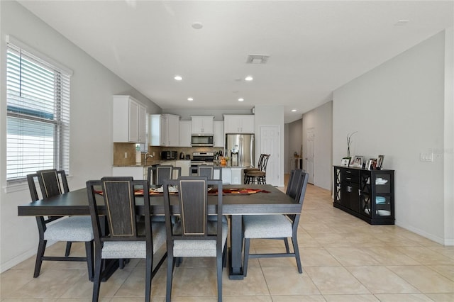 dining room with light tile patterned floors