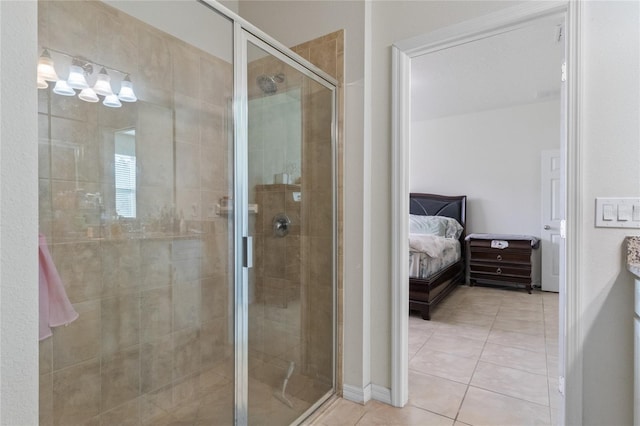 bathroom featuring tile patterned flooring and walk in shower