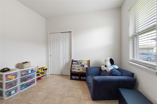 sitting room featuring light tile patterned floors