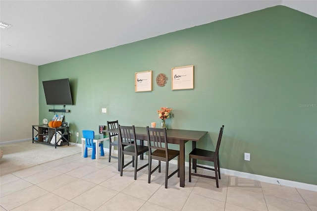 1820 Holden Ridge Ln, Clermont, FL 34715 - tiled dining area with visible vents, baseboards, and vaulted ceiling