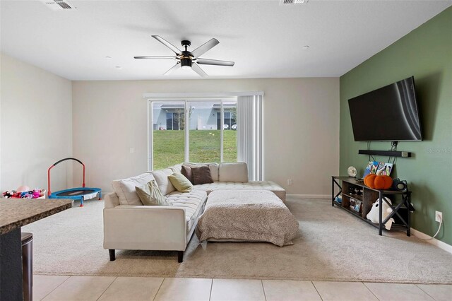 bedroom featuring ceiling fan and light tile patterned floors