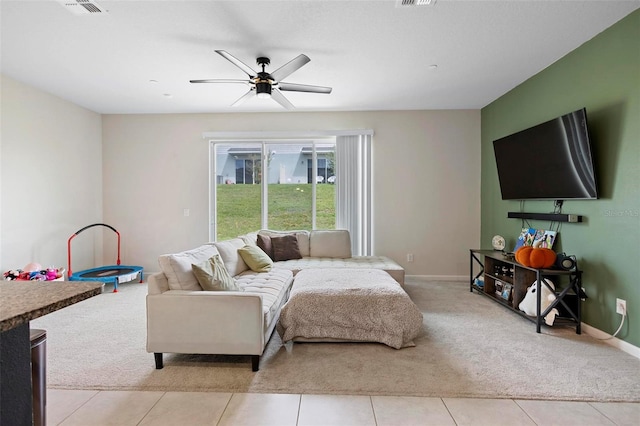 1820 Holden Ridge Ln, Clermont, FL 34715 - living room with baseboards, light carpet, visible vents, and a ceiling fan