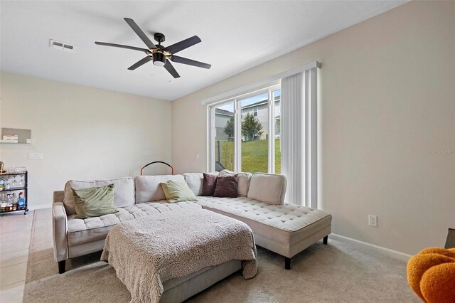 bedroom featuring ceiling fan and light tile patterned floors