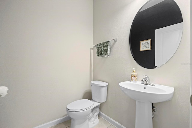 1820 Holden Ridge Ln, Clermont, FL 34715 - half bathroom featuring baseboards, toilet, and tile patterned flooring